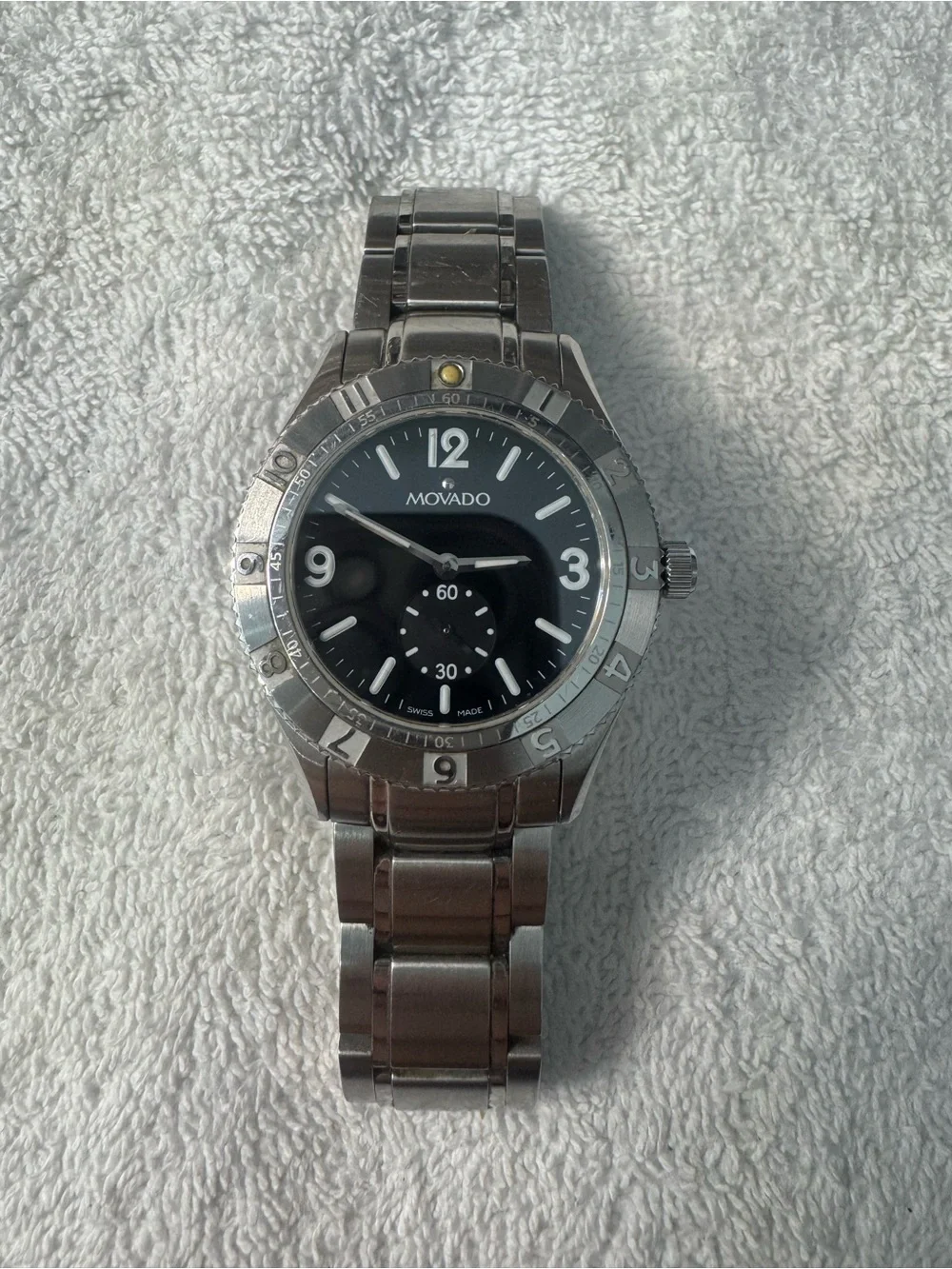 #147 Movado Stainless Steel Watch with Black Dial and Silver Bracelet